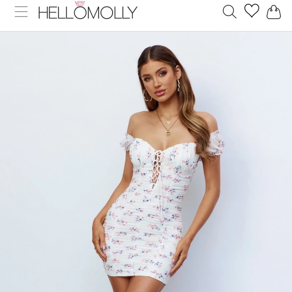 White and pink floral printed dress. Size Medium. New with tags